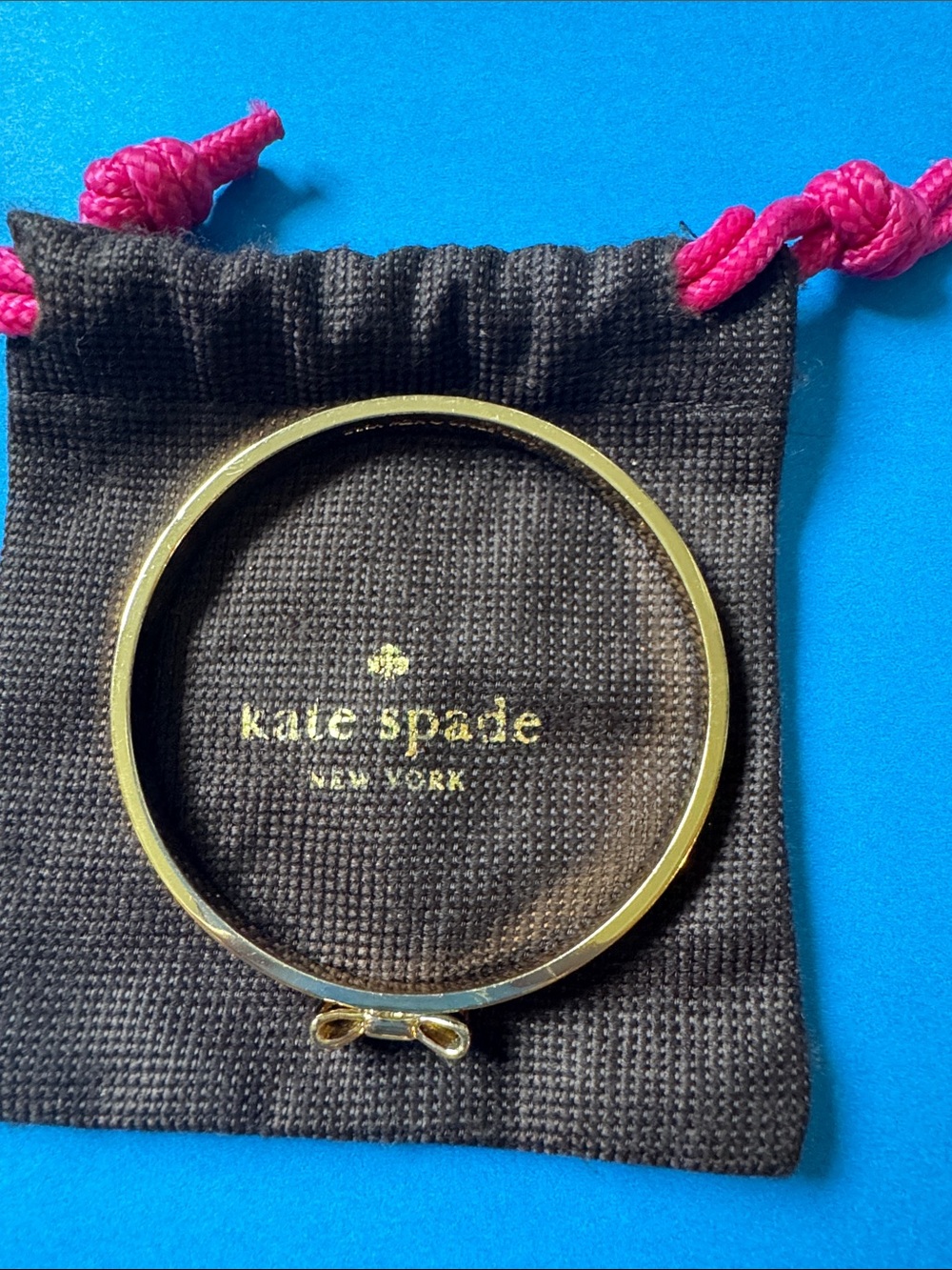 kate spade gold-tone bow bangle bracelet